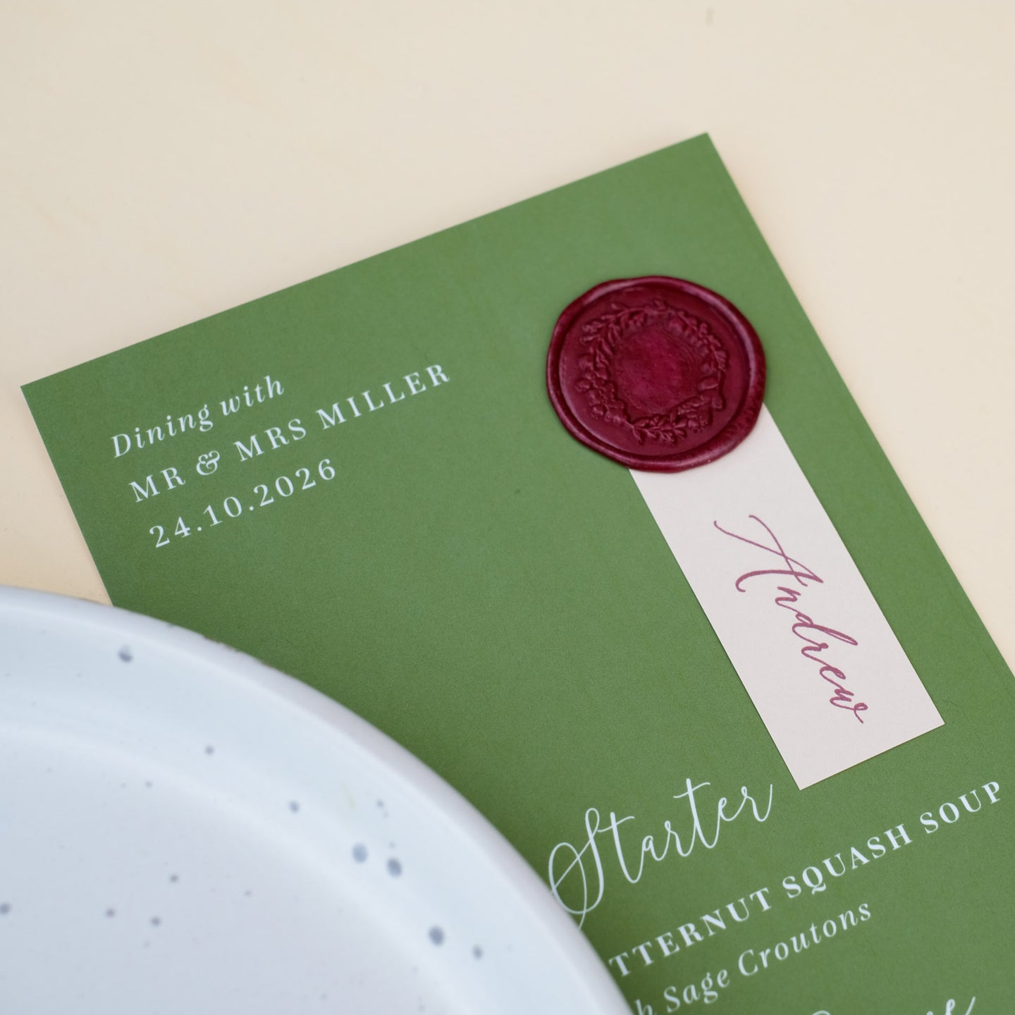 moss green wedding menu with guest name and wax seal